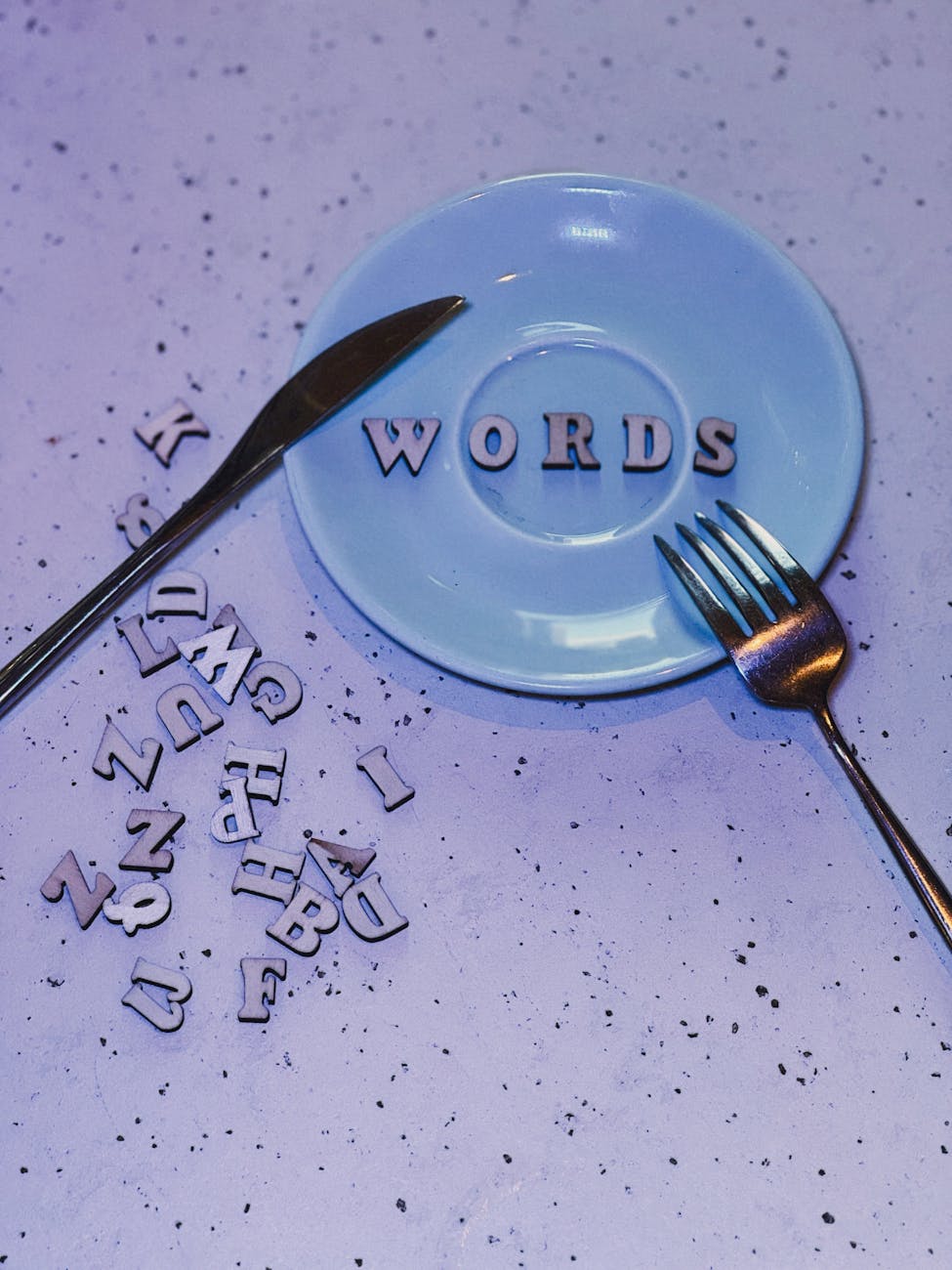 creative alphabet art with words on plate